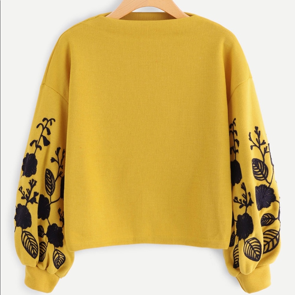 Yellow embroidered sweater